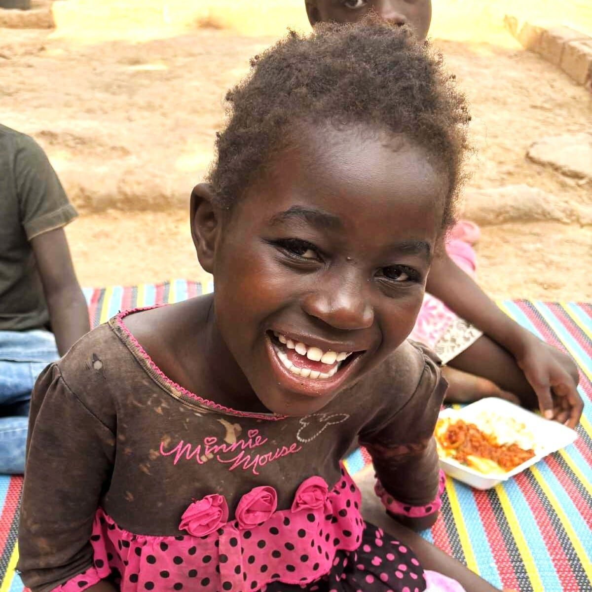Maureen eating feeding program Sponsor